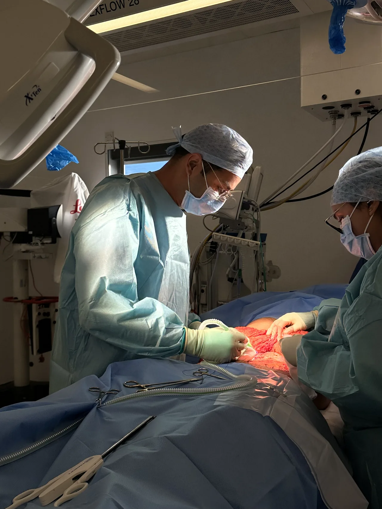 Mr Patel and the surgical team during a breast enlargement operation